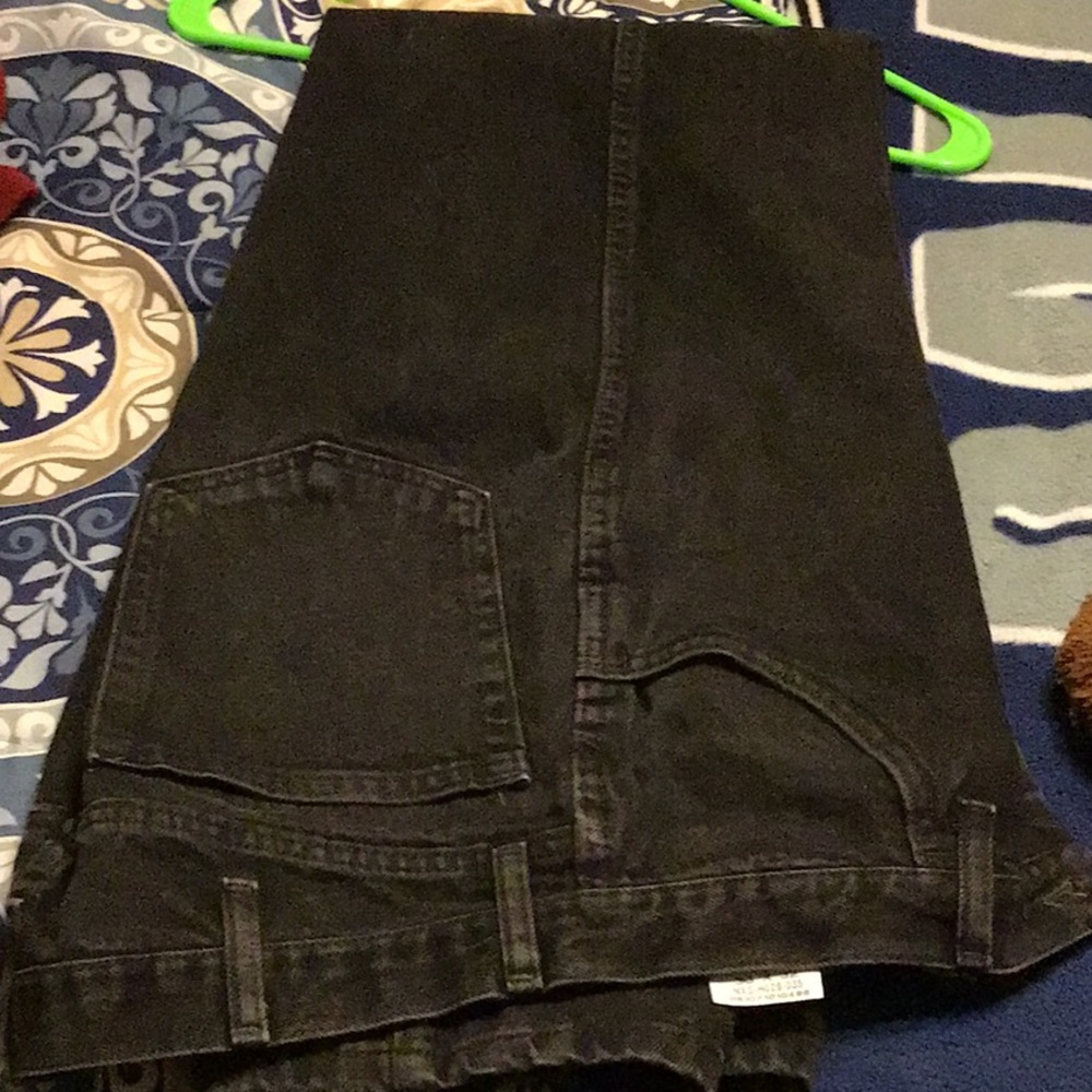 Men’s black Rustler jeans